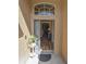 Inviting foyer with wood-look flooring and a view into the open-concept living spaces at 2604 Clareside Dr, Valrico, FL 33596