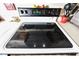 Clean black cooktop four-burner electric range oven, ready for cooking meals at 2604 Clareside Dr, Valrico, FL 33596