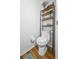 Well-maintained toilet with a storage shelf for organization and convenience at 2604 Clareside Dr, Valrico, FL 33596