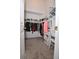 Spacious walk-in closet with ample storage space and functional layout at 2604 Clareside Dr, Valrico, FL 33596