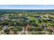 Overhead view pinpointing the property within a community surrounded by mature landscaping and green spaces at 3001 Folklore Dr, Valrico, FL 33596