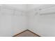 A walk in closet with wire shelving and carpeted floor at 3001 Folklore Dr, Valrico, FL 33596