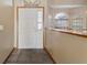 Bright entryway with a white front door, tiled floor, and views of arched windows at 3001 Folklore Dr, Valrico, FL 33596