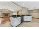 Kitchen with granite countertops, white cabinetry, and an open view of the living space at 3001 Folklore Dr, Valrico, FL 33596