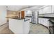 Well-appointed kitchen featuring white cabinets, stainless steel appliances, and granite countertops at 3001 Folklore Dr, Valrico, FL 33596