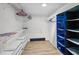 Bright closet with built in wire racks and wooden floor at 3062 Eastland Blvd # 402, Clearwater, FL 33761