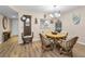 Cozy dining room featuring a round table with comfortable seating, ideal for intimate gatherings at 3062 Eastland Blvd # 402, Clearwater, FL 33761