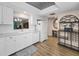 Kitchen featuring sleek white cabinetry and modern appliances at 3062 Eastland Blvd # 402, Clearwater, FL 33761