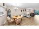 Inviting living room features modern decor, stylish furnishings, and wood flooring, creating a comfortable living space at 3062 Eastland Blvd # 402, Clearwater, FL 33761
