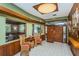 Community building lobby with decorative chairs and views through to a lounge space at 3062 Eastland Blvd # 402, Clearwater, FL 33761
