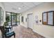 Well-maintained lobby area with tile floors, ample seating, and a community bulletin board at 3062 Eastland Blvd # 402, Clearwater, FL 33761