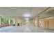 Indoor parking garage with assigned parking spots and ample overhead lighting at 3062 Eastland Blvd # 402, Clearwater, FL 33761