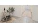 Charming hallway featuring tile flooring and a serving cart at 32803 Pez Landing Ln, Wesley Chapel, FL 33543