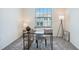 Bright office space featuring a modern desk setup and a view from the window at 32803 Pez Landing Ln, Wesley Chapel, FL 33543