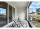 Relaxing screened patio with comfortable seating and views of the landscaped backyard at 32803 Pez Landing Ln, Wesley Chapel, FL 33543