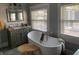 Elegant bathroom with a freestanding tub, vanity, and modern fixtures at 336 9Th Ne Ave, St Petersburg, FL 33701