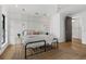 This bedroom offers great natural light, hardwood floors, and a nice rug at 3501 W Tacon St, Tampa, FL 33629