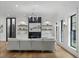 Bright living room features hardwood floors, recessed lighting, and an electric fireplace at 3501 W Tacon St, Tampa, FL 33629