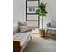 Cozy living room nook with modern sofa, window view, and stylish accents at 3501 W Tacon St, Tampa, FL 33629