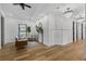 Open living space with modern decor, hardwood floors, and lots of natural light at 3501 W Tacon St, Tampa, FL 33629