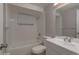 Clean bathroom featuring a tiled shower/tub combo and a white vanity at 3601 Grayton Dr, New Port Richey, FL 34652