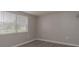 Bedroom view of vinyl floors, window and light gray walls at 3601 Grayton Dr, New Port Richey, FL 34652