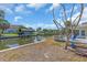 Waterfront property with a private dock, canal access, and outdoor seating area perfect for relaxing at 396 Avenida Madera, Sarasota, FL 34242