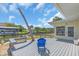 Waterfront deck with seating and room for entertaining at 396 Avenida Madera, Sarasota, FL 34242