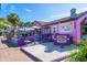 Charming Siesta Key restaurant with colorful exterior, outdoor seating, and vibrant atmosphere at 396 Avenida Madera, Sarasota, FL 34242