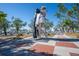 Statue of sailor kissing nurse statue, a timeless symbol of love and remembrance in a waterfront park setting at 396 Avenida Madera, Sarasota, FL 34242