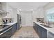Modern kitchen boasts stainless appliances, stylish cabinets, and ample counter space at 4175 20Th N St, St Petersburg, FL 33741