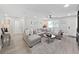 Spacious living room featuring a large sectional sofa and modern decor at 4175 20Th N St, St Petersburg, FL 33741