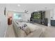 Comfortable living room with a large entertainment center and ample seating at 4175 20Th N St, St Petersburg, FL 33741