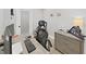 Bright office features a modern desk, ergonomic chair, neutral colors, and patriotic decor at 4175 20Th N St, St Petersburg, FL 33741