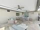 The covered patio includes ceiling fans, recessed lighting, and comfortable wicker seating, creating an ideal outdoor living space at 4175 20Th N St, St Petersburg, FL 33741