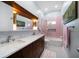 Bathroom featuring unique tile work, modern fixtures and a glass shower at 4610 Cypress S Way, St Petersburg, FL 33705
