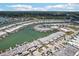 Amazing aerial view of waterfront neighborhood with boat docks and lush landscaping at 467 Boca Ciega Point S Blvd, St Petersburg, FL 33708