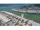 Stunning aerial view of waterfront property with boat docks and access to open water at 467 Boca Ciega Point S Blvd, St Petersburg, FL 33708