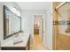 Stylish bathroom with a modern vanity, and a glass-enclosed shower at 467 Boca Ciega Point S Blvd, St Petersburg, FL 33708