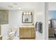 Updated bathroom with a vanity, mirror, soft lighting, and a step in shower at 467 Boca Ciega Point S Blvd, St Petersburg, FL 33708