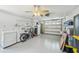Spacious two car garage with laundry hookups, epoxy floor, and ceiling fan at 467 Boca Ciega Point S Blvd, St Petersburg, FL 33708