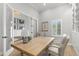 Bright and inviting home office features hardwood floors, white trim, and a comfortable workspace at 5043 Night Star Trl, Odessa, FL 33556