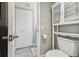 Bathroom with a toilet, cabinets, and a view of a closet for storage at 6009 Sea Ranch Dr # 107E, Hudson, FL 34667