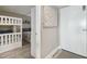 Cozy bedroom with a bunk bed, nautical decor, and tile flooring, offering a comfortable space at 6009 Sea Ranch Dr # 107E, Hudson, FL 34667