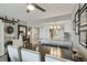 Open concept view of dining area with laundry, kitchen and breakfast bar at 6009 Sea Ranch Dr # 107E, Hudson, FL 34667
