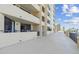 Building exterior showing multiple balconies and community pool and beach access, with relaxing atmosphere at 6009 Sea Ranch Dr # 107E, Hudson, FL 34667