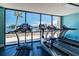 Bright fitness center featuring modern equipment and a beautiful waterfront view at 6009 Sea Ranch Dr # 107E, Hudson, FL 34667