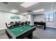 Game room featuring a poker table, foosball table, and a mini pool table at 6009 Sea Ranch Dr # 107E, Hudson, FL 34667