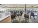 Meeting room featuring large windows with views, carpeted floor, and many tables with seating at 6009 Sea Ranch Dr # 107E, Hudson, FL 34667