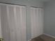 Ample closet space featuring bi-fold doors, perfect for organized storage at 6015 19Th N St # 301, St Petersburg, FL 33714